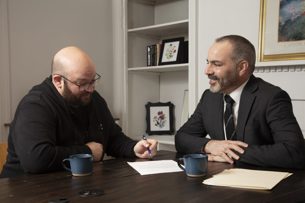 Jeff-Weiskopf-Westchester--personal-injury-Attorney-with-Client